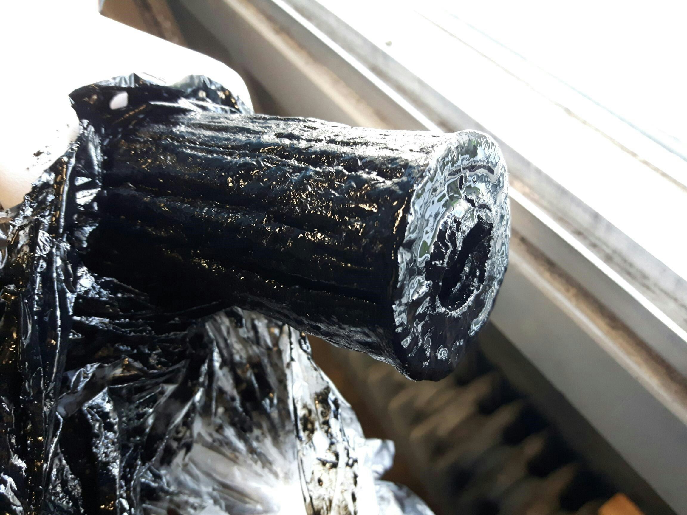 Waarschuwing: dit beeld kan schokkend zijn. Oliefilter na 93.000 km trouwe dienst in een moderne diesel.