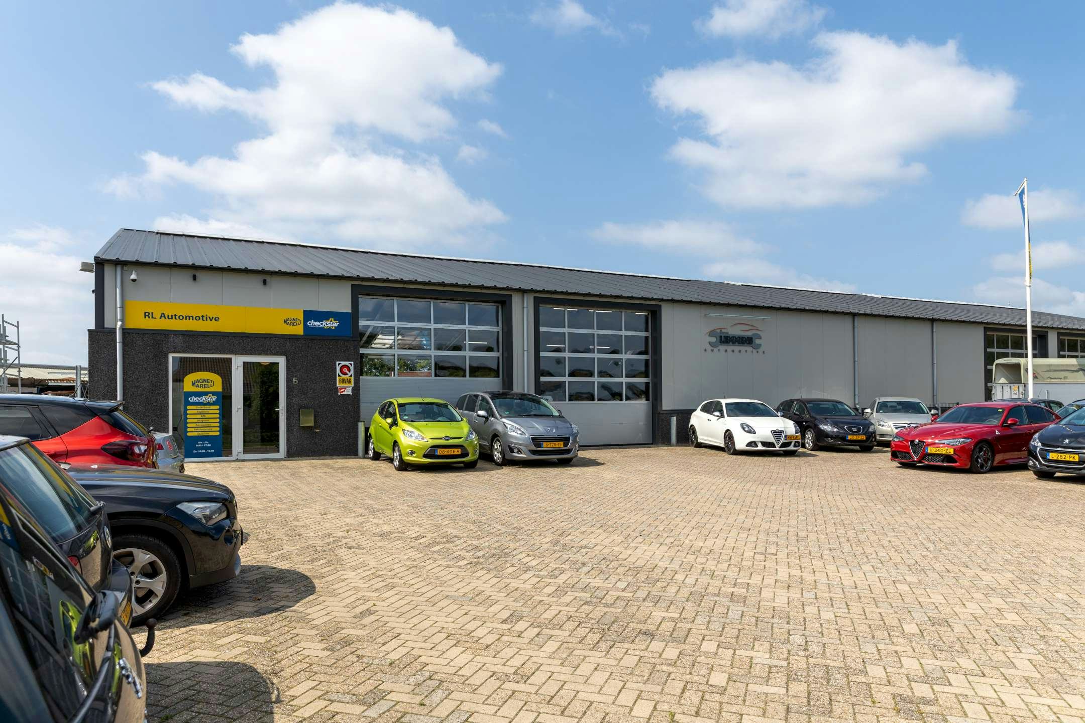 Dit is RL Automotive aan de rand van Overloon in de blauw-gele huisstijl van Checkstar; één van de vier nieuwe leden.