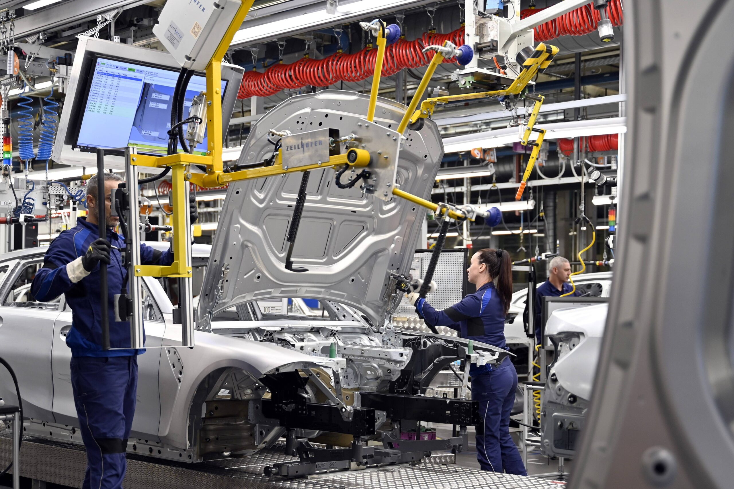 Autoproductie in de BMW-fabriek in München. - Foto: ANP