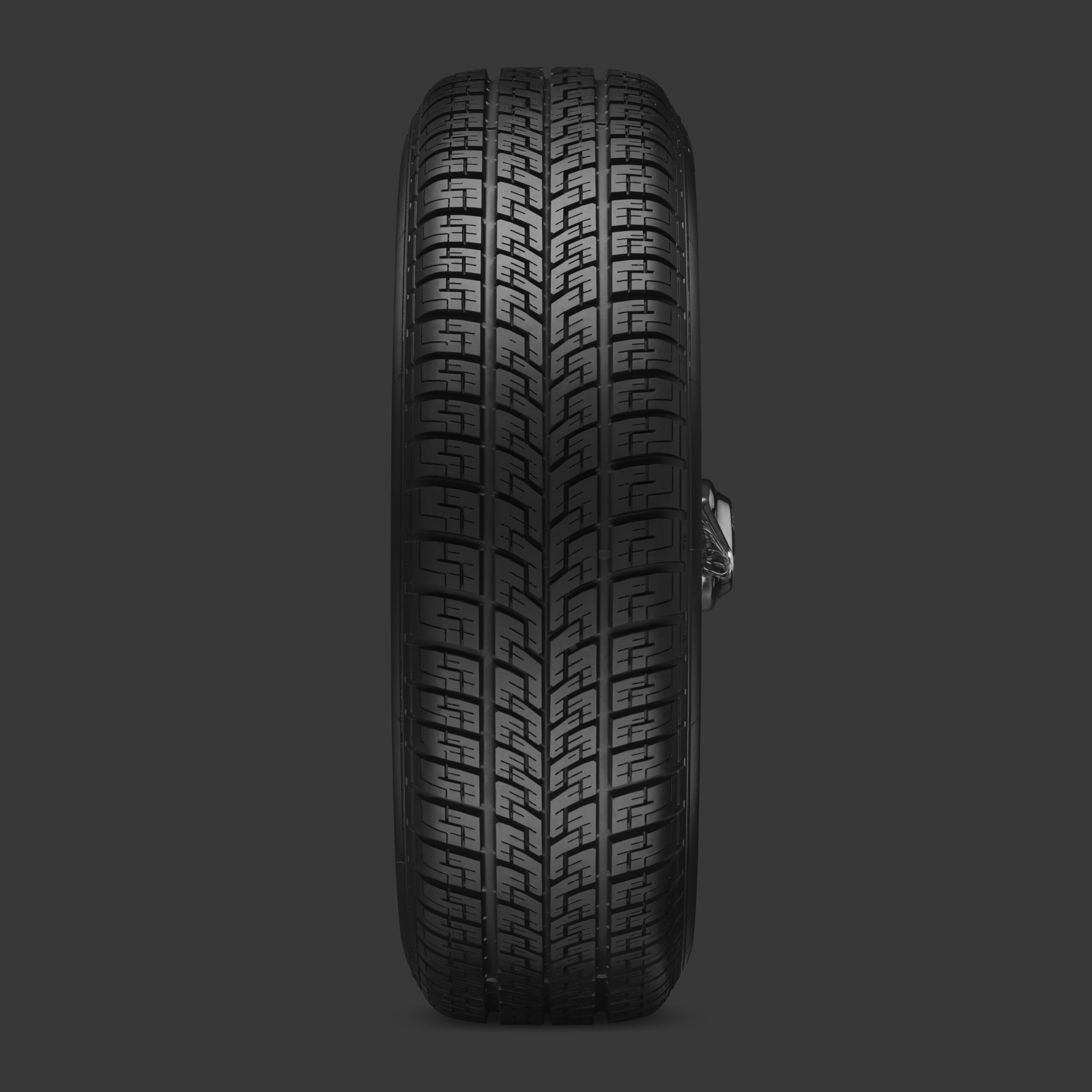 De Vredestein Quatrac Classic heeft een directioneel profiel met afvoergroeven tegen aquaplaning. - Foto: Vredestein