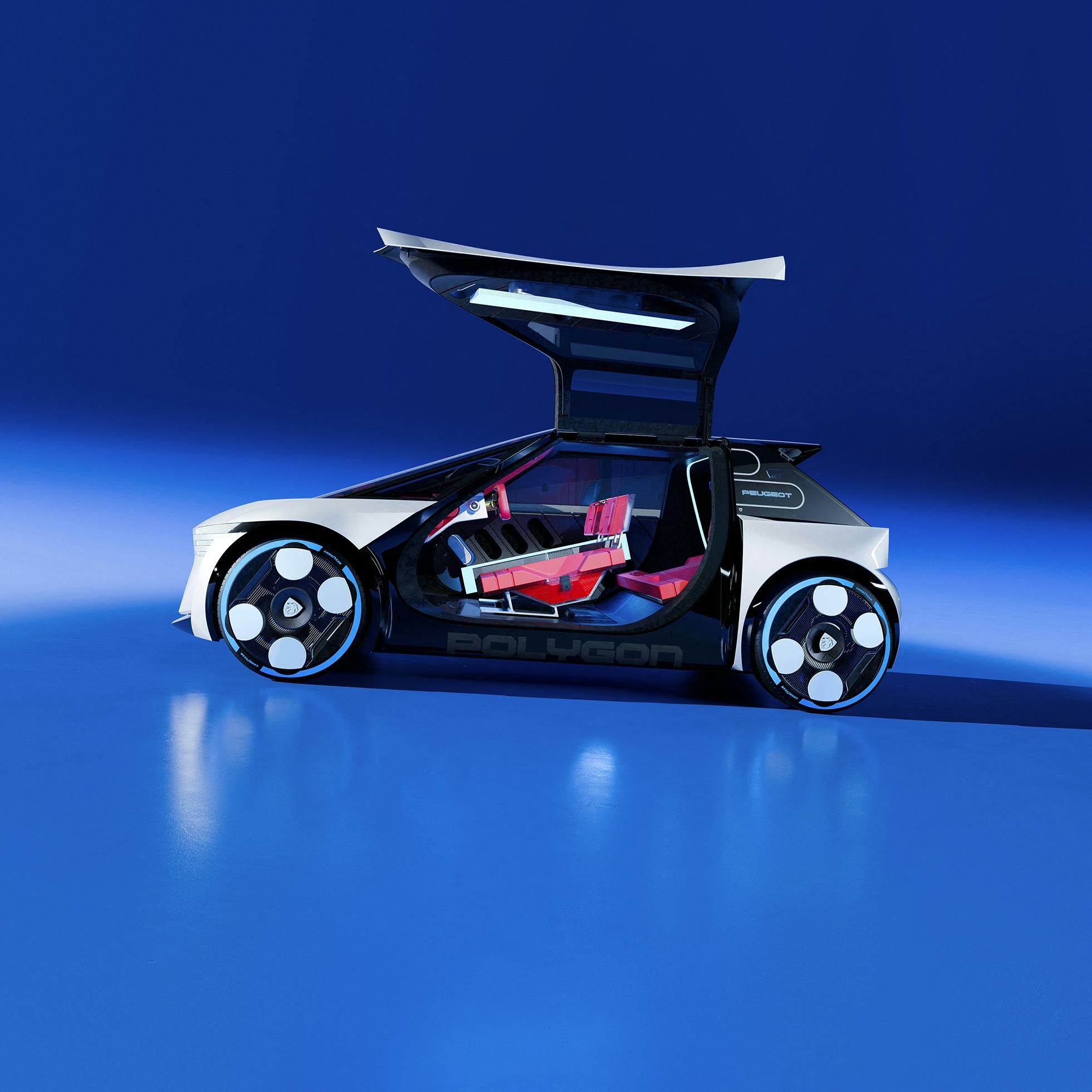 Bijna de hele zijkant van de Polygon klapt open. Merk op dat de voorste zitrij halverwege de auto staat, geen lange cabine zoals juist bij elektrische auto’s mogelijk.