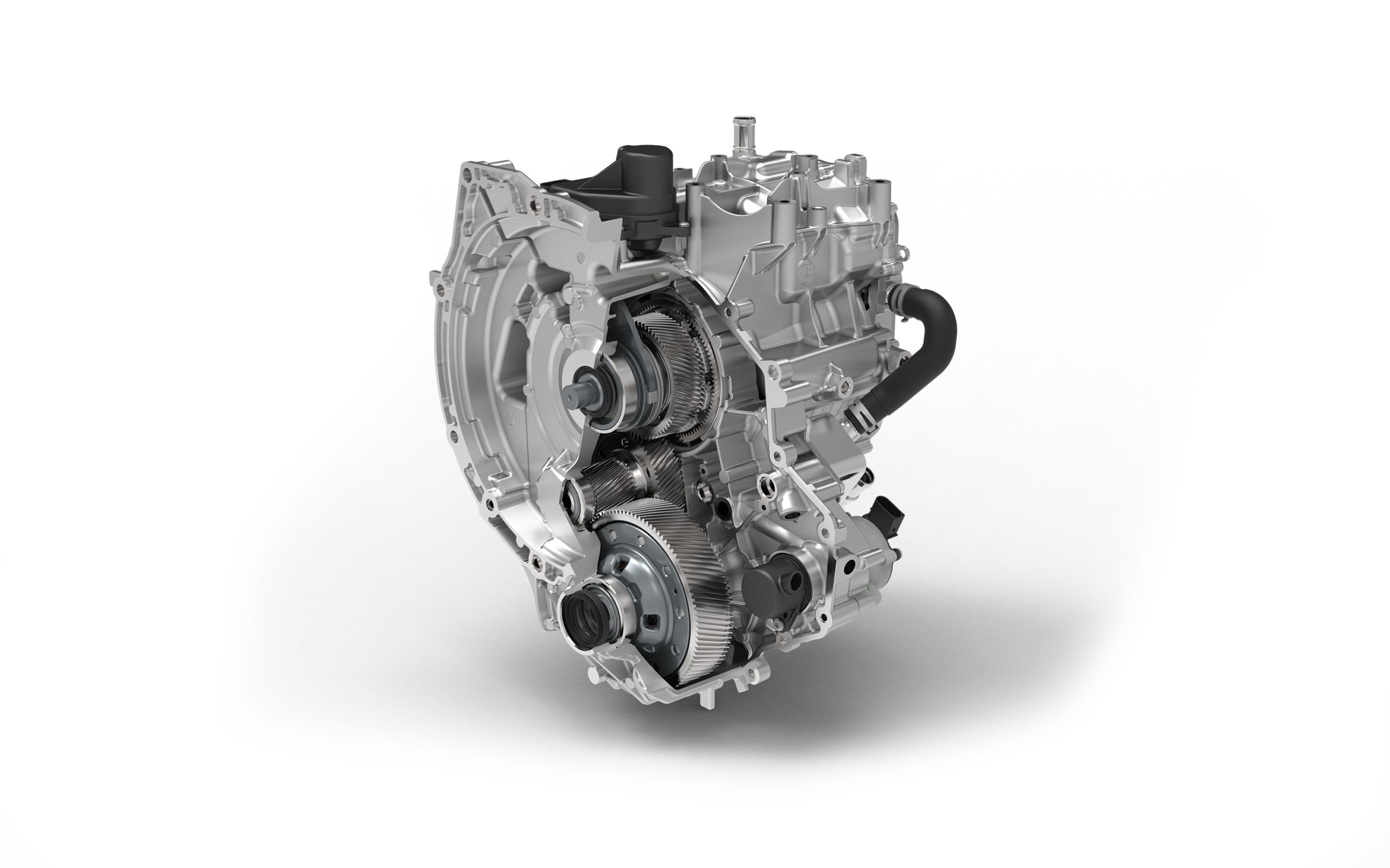 De eRE+ op zijn kant, bovenin de ingang voor de benzinemotor. Achter een planetaire tandwielset de generator. Voorop die set een synchromesh schakeling om ook het differentieel onderaan direct aan te koppelen. Vandaar het plusje, behalve als range exender kan de eRE+ ook als ‘drive extender’ optreden.  