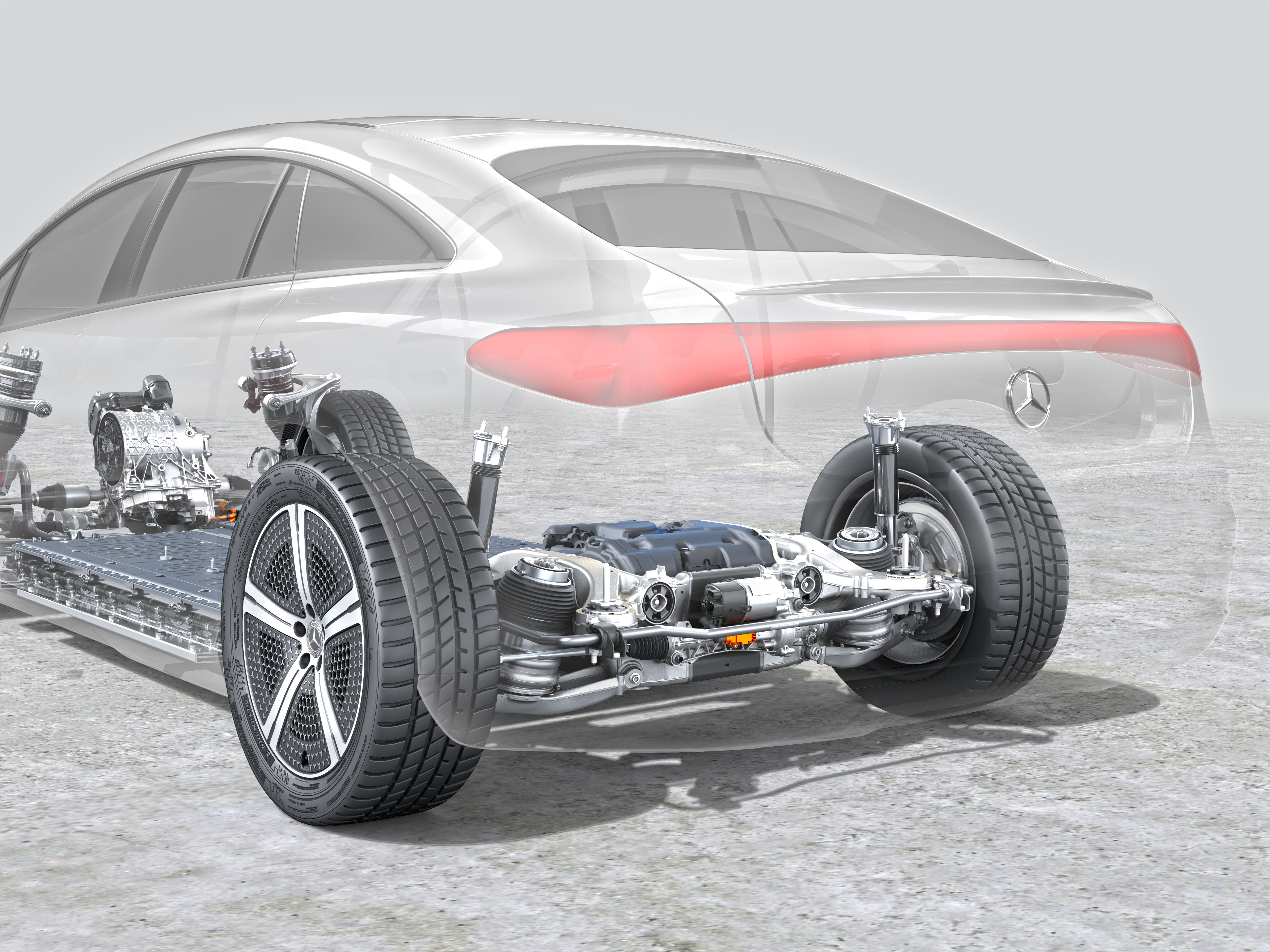 Volledig steer-by-wire als EQS primeur, maar de achteras besturing was eigenlijk al lang ‘by-wire’. Zie de stuurmotor middenin, boven de oranje stekker. - Foto: Mercedes-Benz
